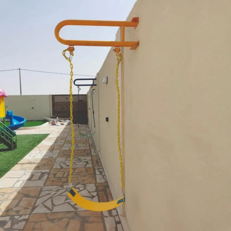 Wall-Mounted Iron Swing With Seat And Chains – Yellowأرجوحة حائط حديد مع مقعد وسلاسل – لون أصفر